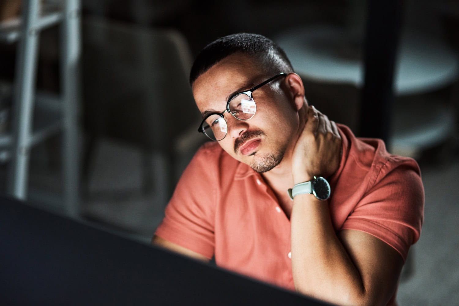 Tired man working late at his desk